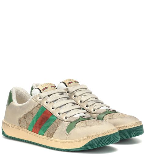 in my gucci tennis shoes running|Gucci screener sneakers.